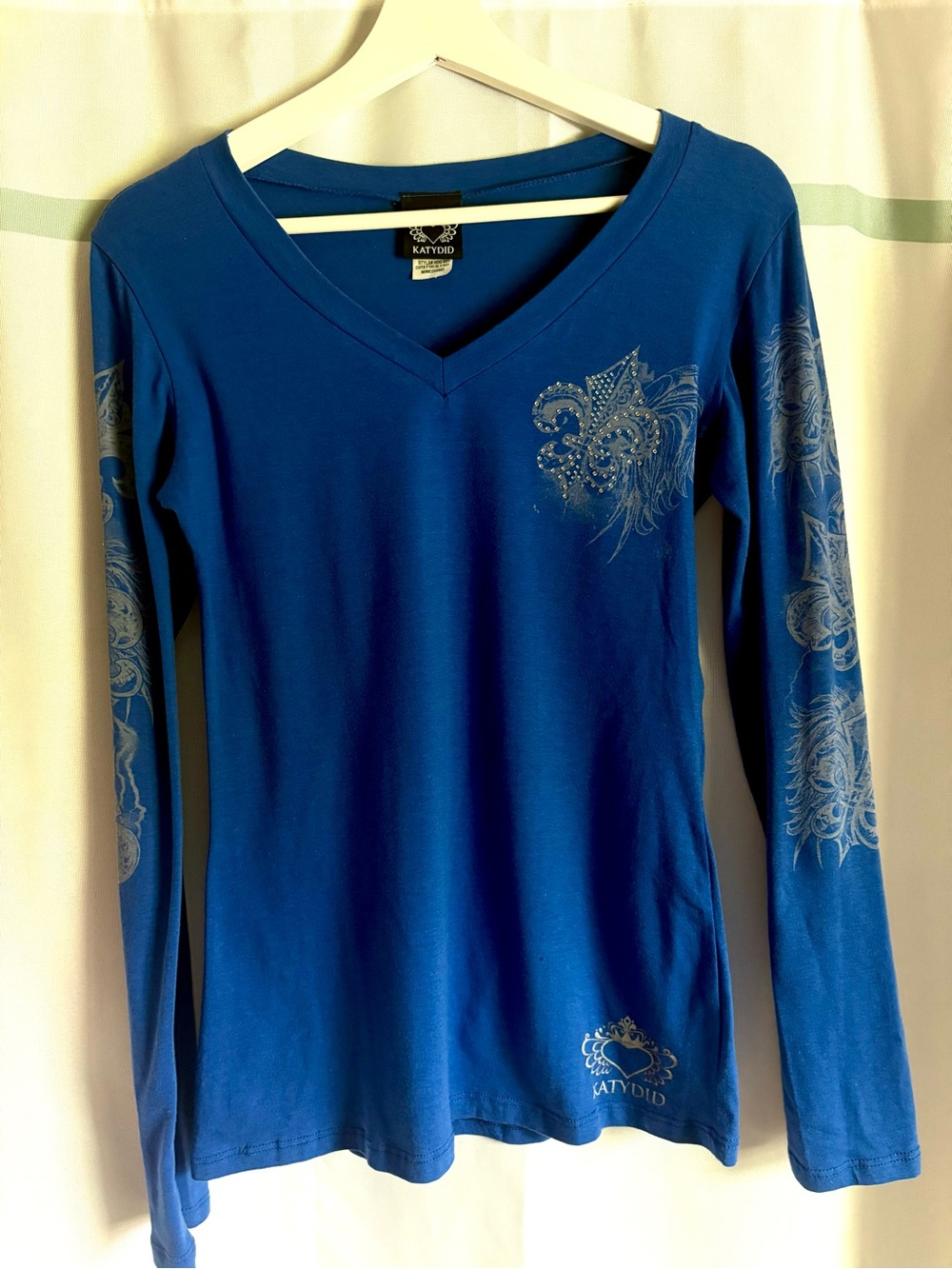 Katydid Blue Long Sleeve V-Neck Top with Silver Decorative Print